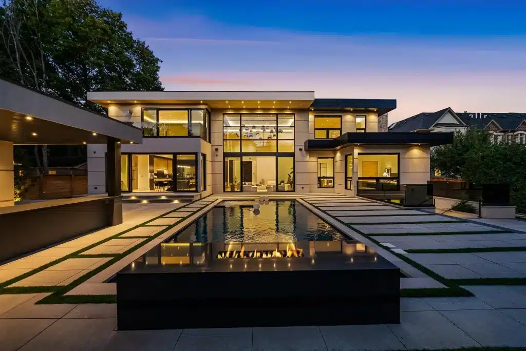 Laureleaf rear elevation and swimming pool at dusk