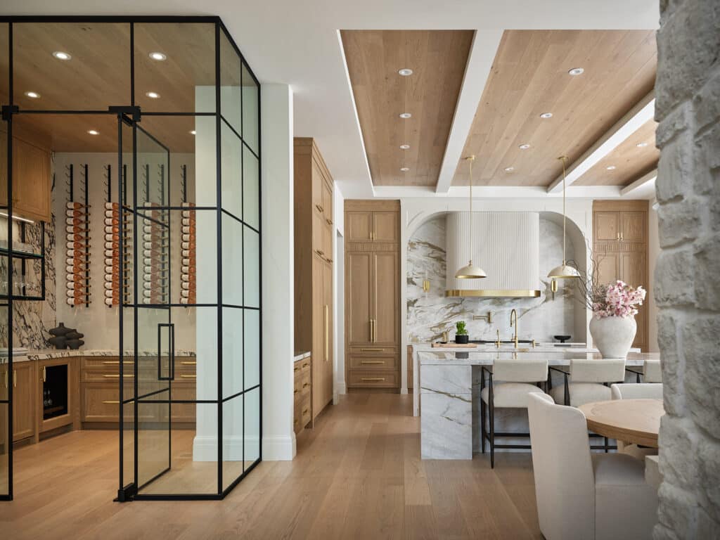 Sideroad kitchen with timber ceiling beams and glass doors
